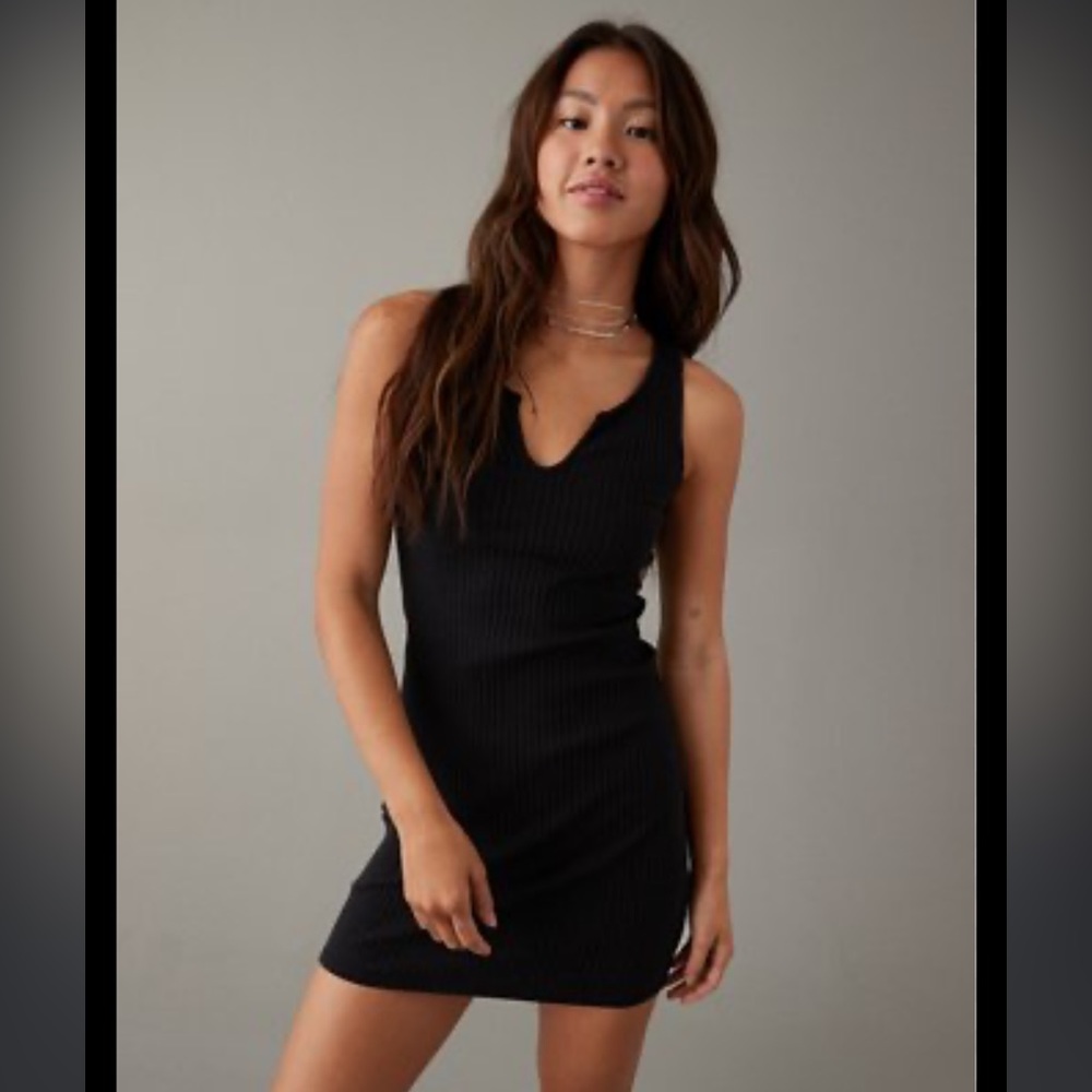 Knit mini dress black size medium/ large bought in the US at Madrag